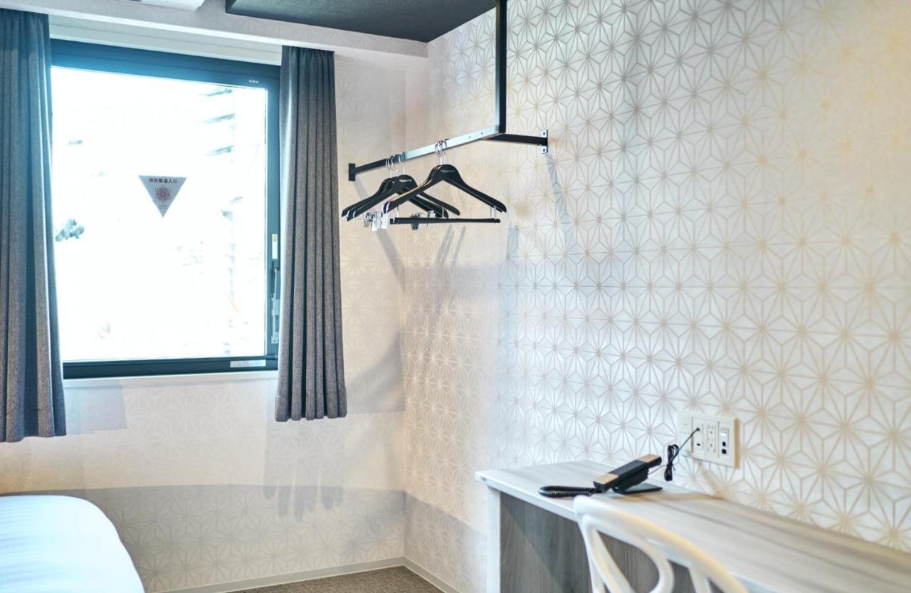 קיטקיושו Rakuten Stay Kokura Station Standard Twin Room With Counter Table מראה חיצוני תמונה